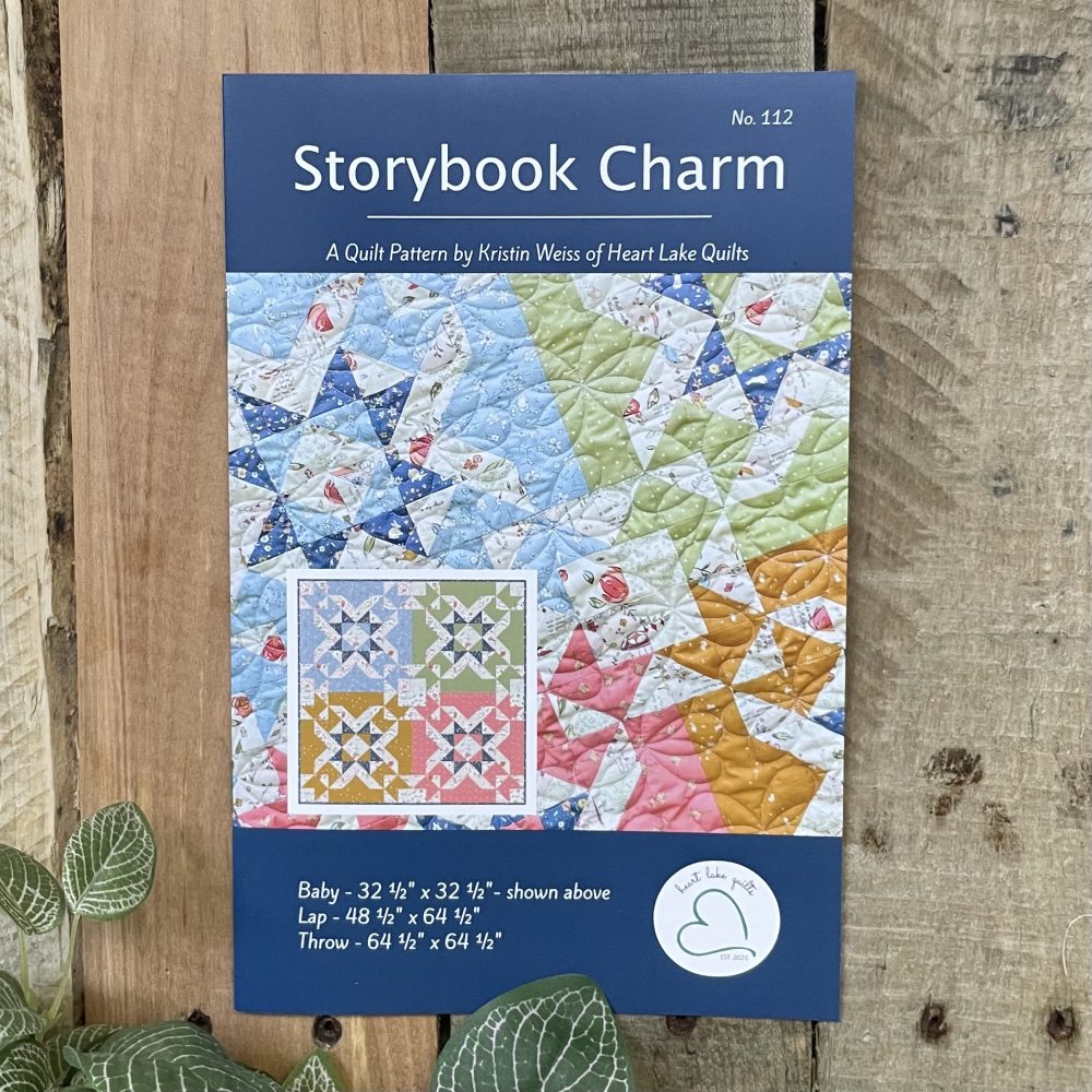 Storybook Charm quilt pattern cover with patchwork design