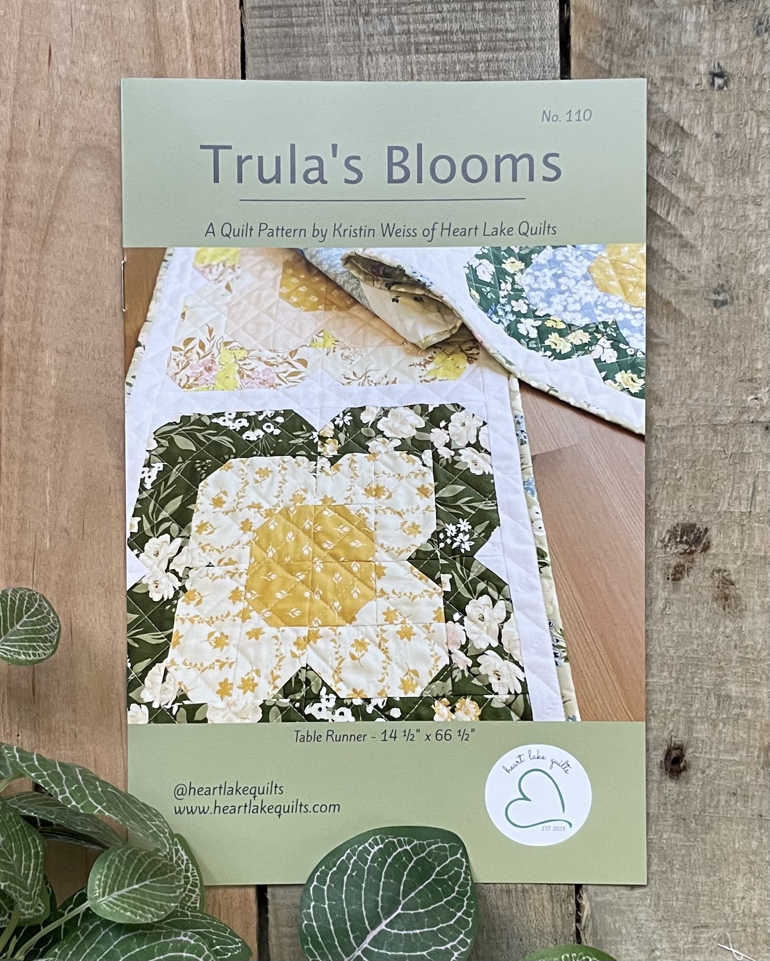 Trula's Blooms quilt pattern cover with floral design