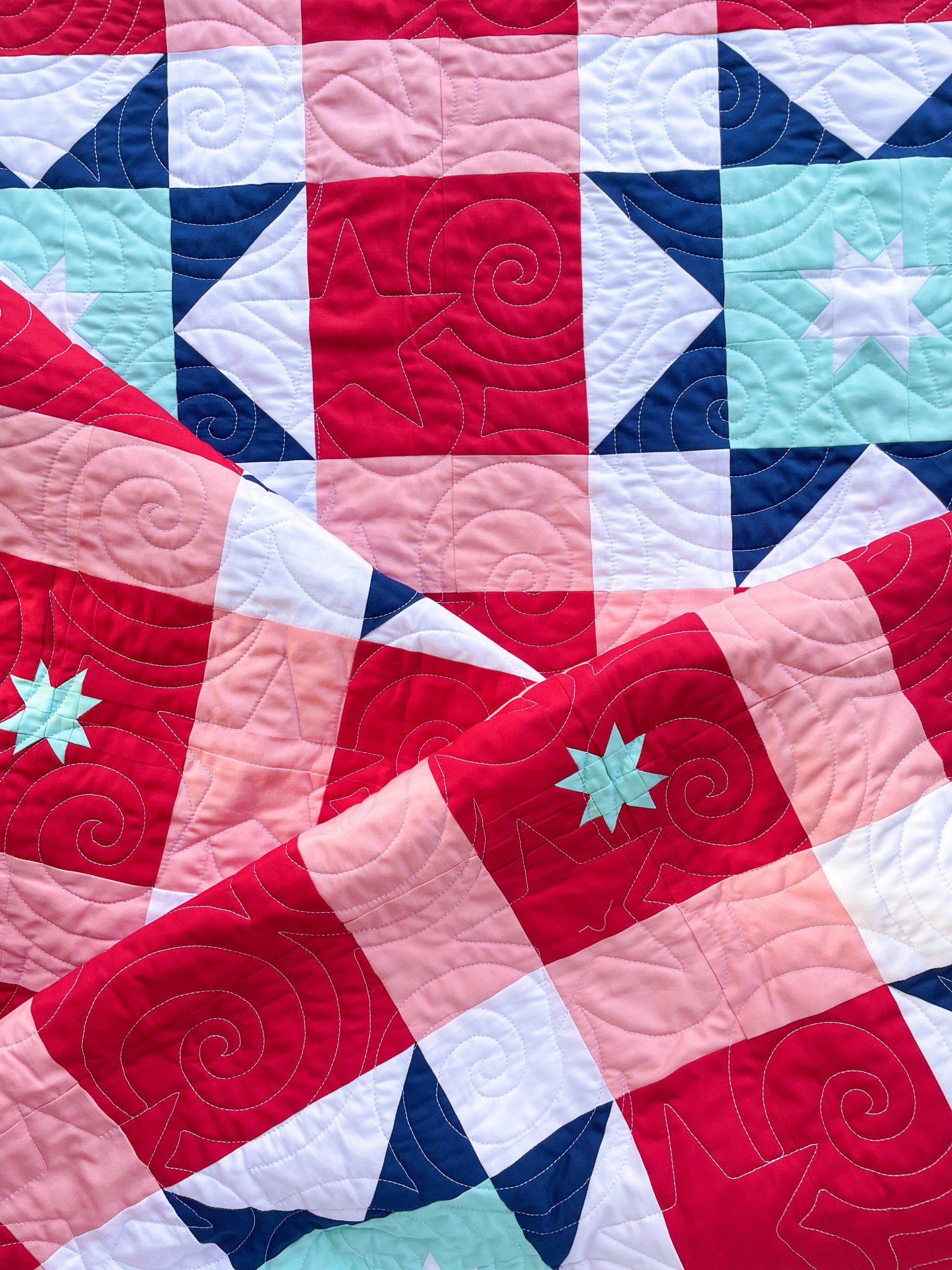 Colorful quilt with geometric patterns.